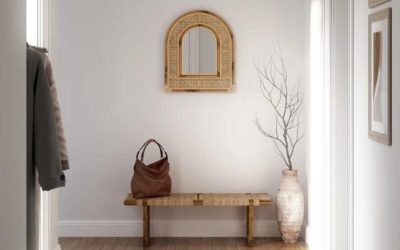 Sustainable rattan mirror hanging on wall